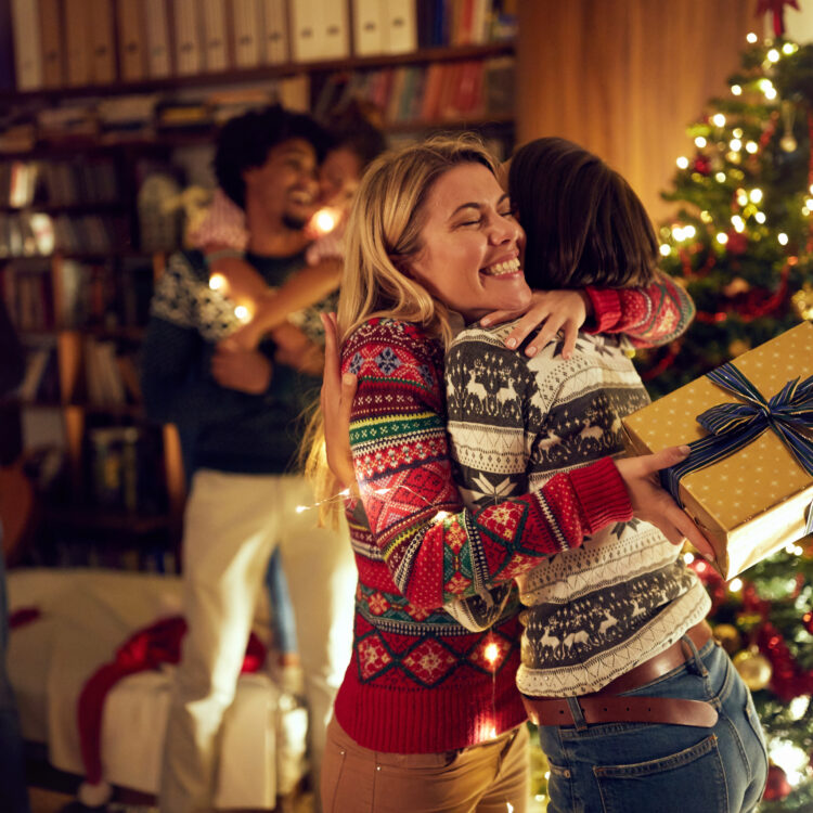 happy girlfriends celebrating Christmas together